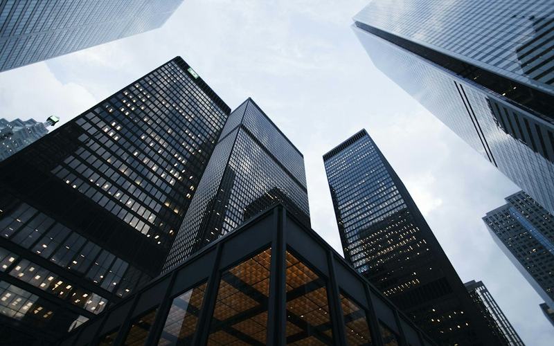 Commercial high-rise buildings viewed from street level